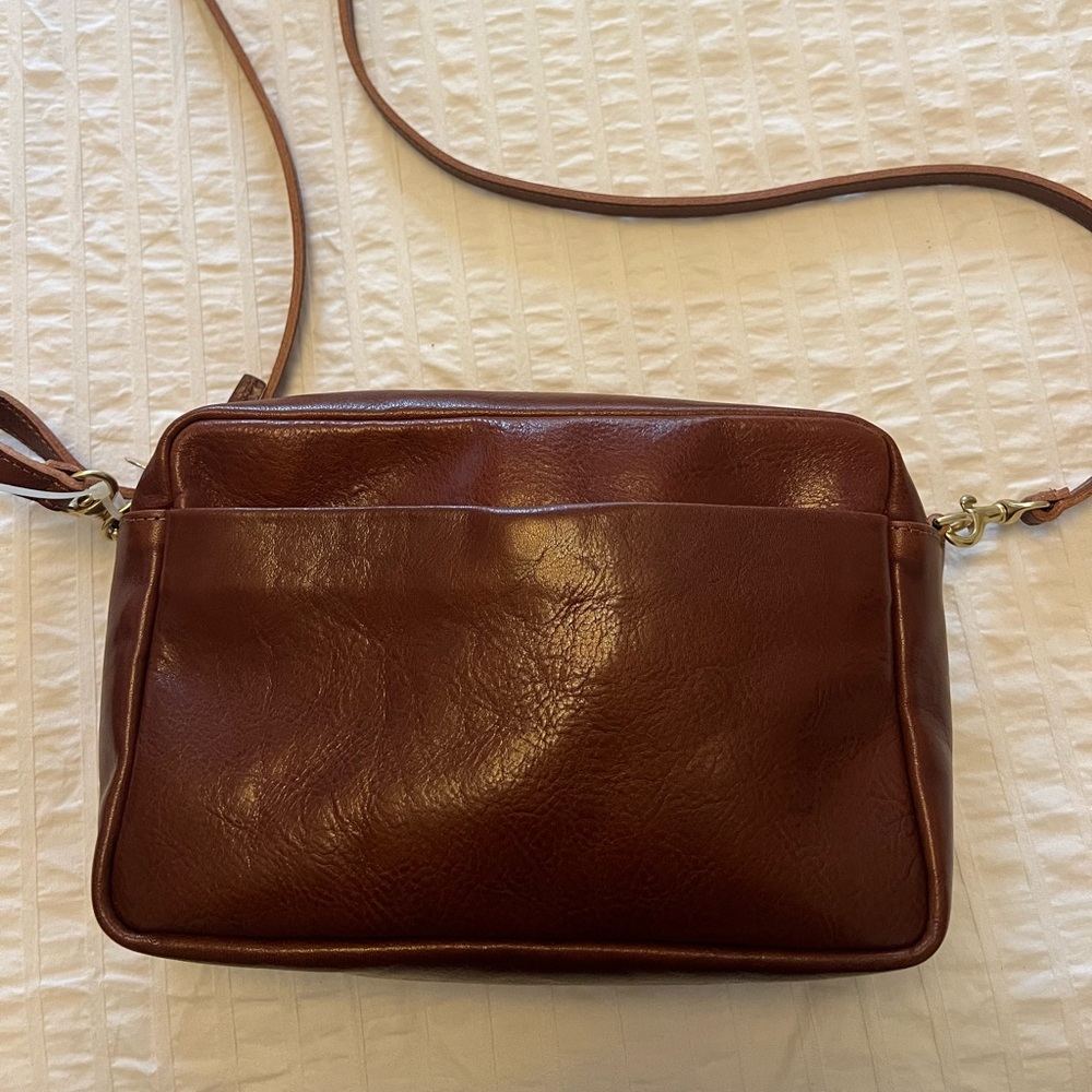 Clare V. Marisol in brown leather.